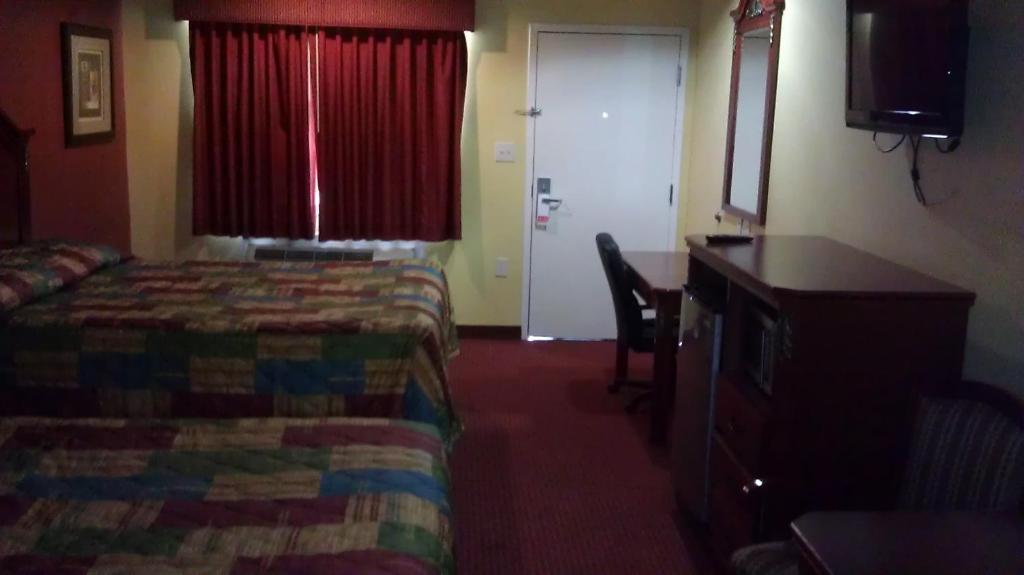 Scottish Inns Suites East Sam Houston Pkwy North Channelview Zimmer foto